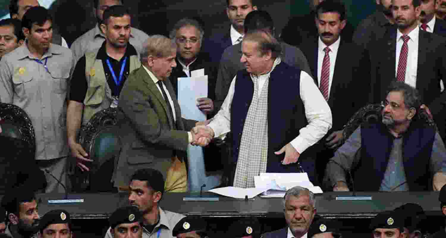 Nawaz Sharif shaking hands with Shahbaz Sharif in Islamabad. Nawaz Sharif shaking hands with Shahbaz Sharif in Islamabad.