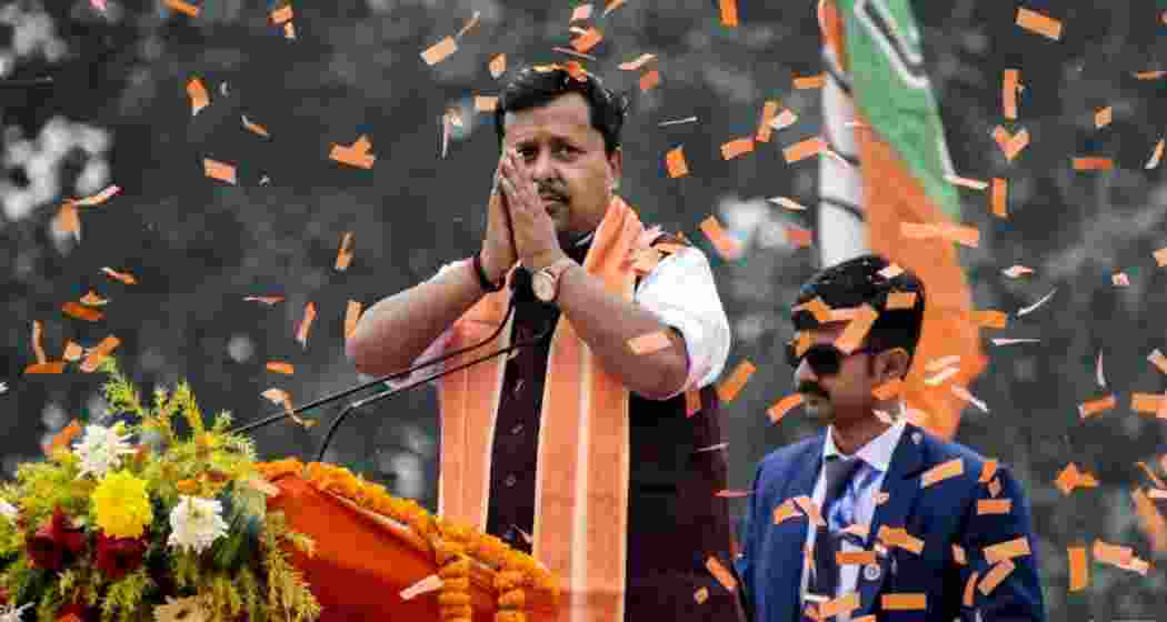BJP national president, Nitin Nabin greets supporters during a rally. 