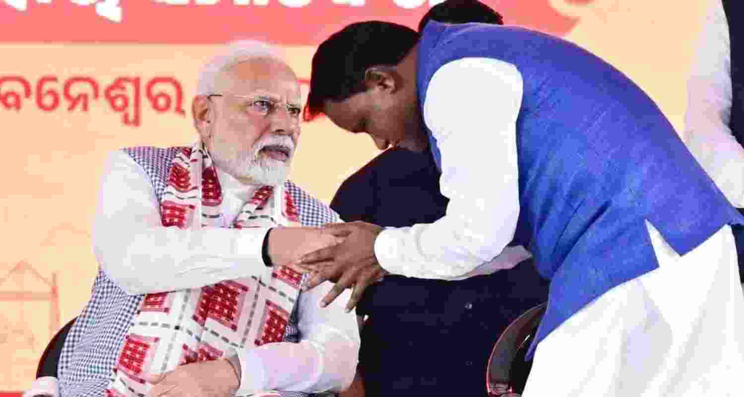 Prime Minister Narendra Modi with Odisha Chief Minister Mohan Charan Majhi.