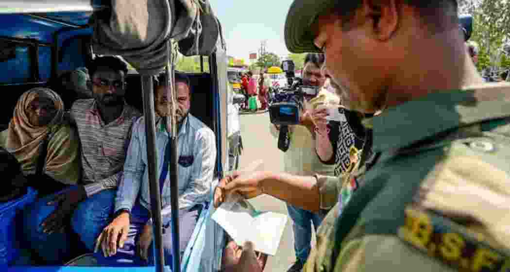 BSF personnel check the passports of Pakistani nationals at the Wagah Attari border before their departure to Pakistan, following the government's directive to ensure compliance with the visa suspension. (Representative image)