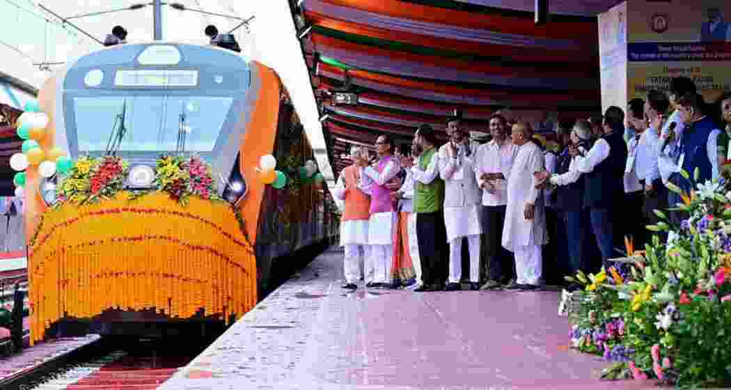 Jharkhand Governor Santosh Gangwar with Union Minister Shivraj Singh Chouhan and others at the flag-off ceremony of six Vande Bharat Express trains, at Tatanagar in Jamshedpur.