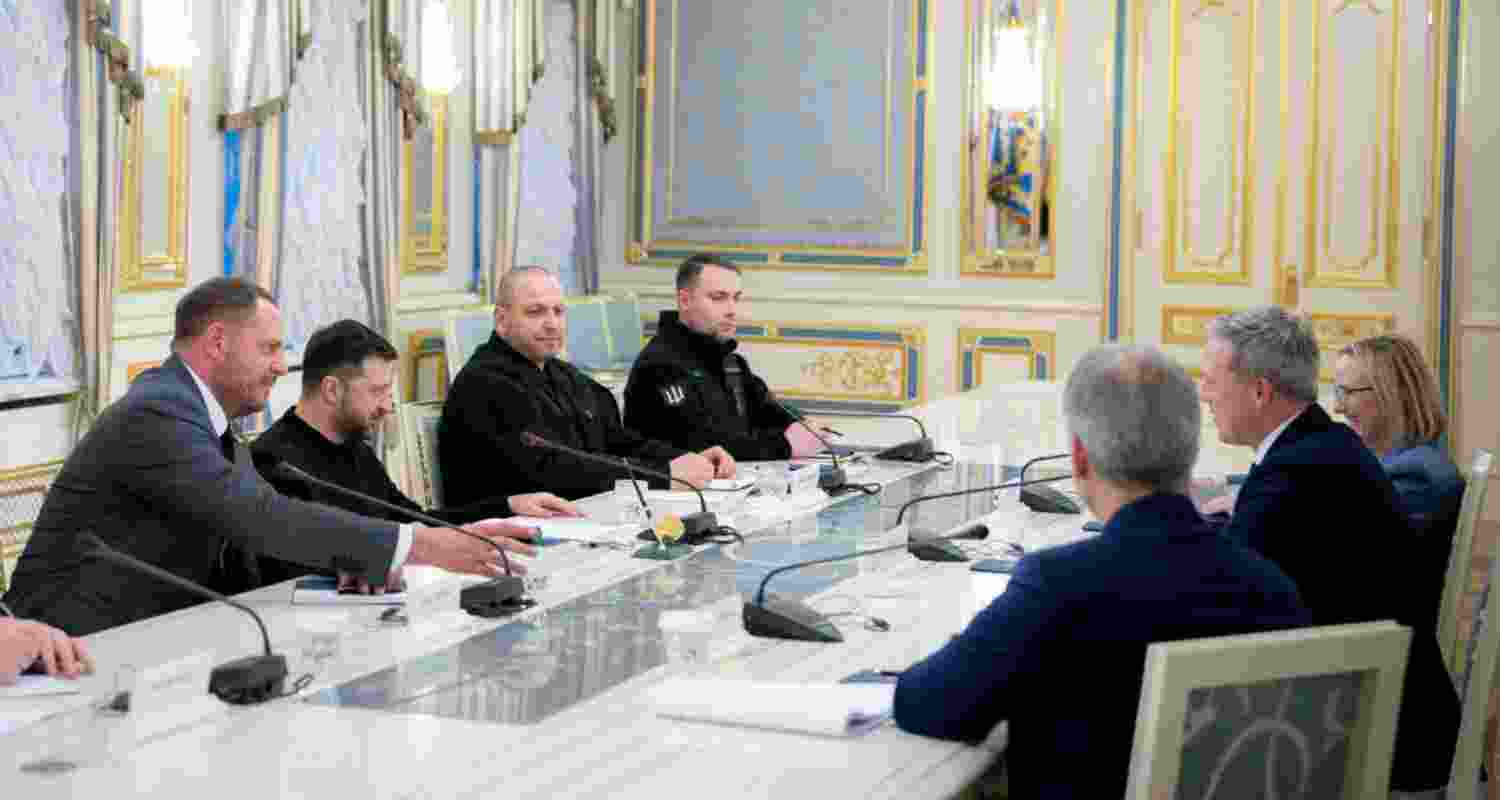 Ukrainian President Volodymyr Zelensky, second left, talks with US Secretary of the Army Dan Driscoll in Kyiv, Ukraine.