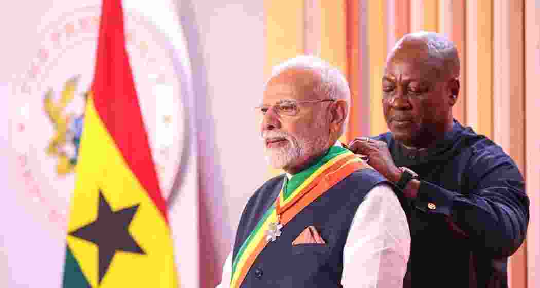 Prime Minister Narendra Modi receives Ghana’s highest civilian honour from President John Mahama at Jubilee House in Accra on Thursday, during the first Indian prime ministerial visit in 30 years.