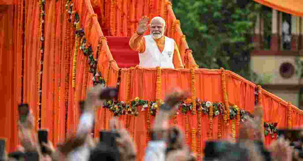 A file photo of Prime Minister Narendra Modi waving at supporters during a rally. 