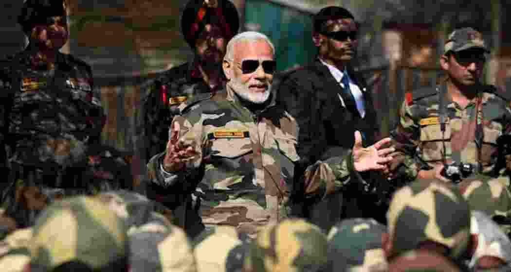 A file photo of Prime Minister Narendra Modi with Indian Army soldiers and BSF personnel. A file photo of Prime Minister Narendra Modi with Indian Army soldiers and BSF personnel.