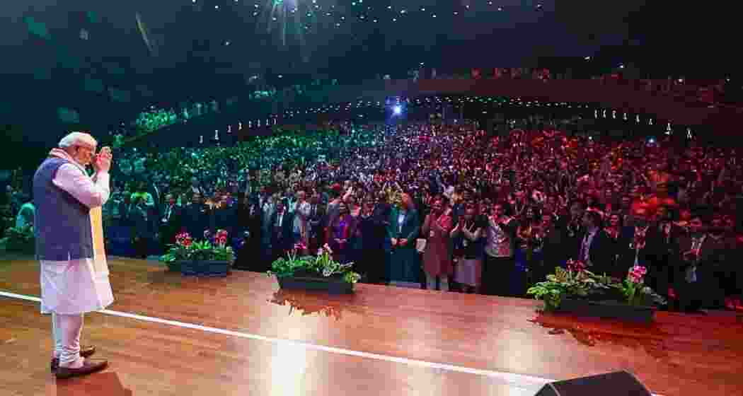 Prime Minister Narendra Modi greets the audience during a community programme, in The Hague, Netherlands. 
