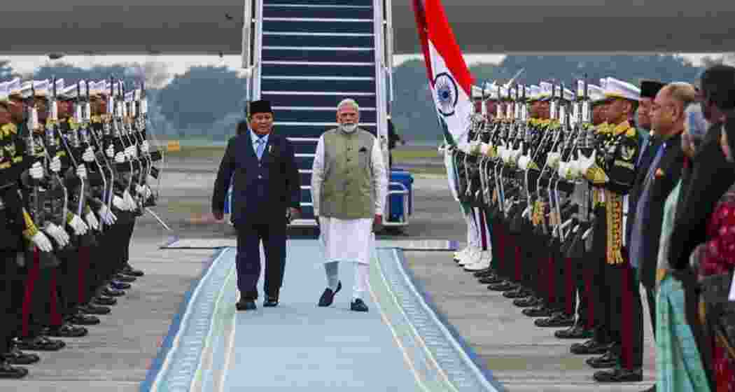 Prime Minister Narendra Modi with Indonesian President Prabowo Subianto after his arrival in Jakarta on Monday.