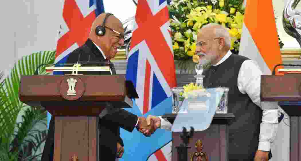 Prime Minister Narendra Modi shakes hands with his Fijian counterpart Sitiveni Rabuka in New Delhi on Monday.
