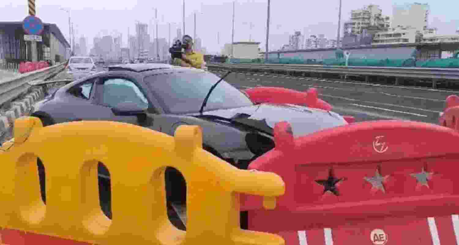 Speeding Porsche rams divider on Mumbai's coastal road