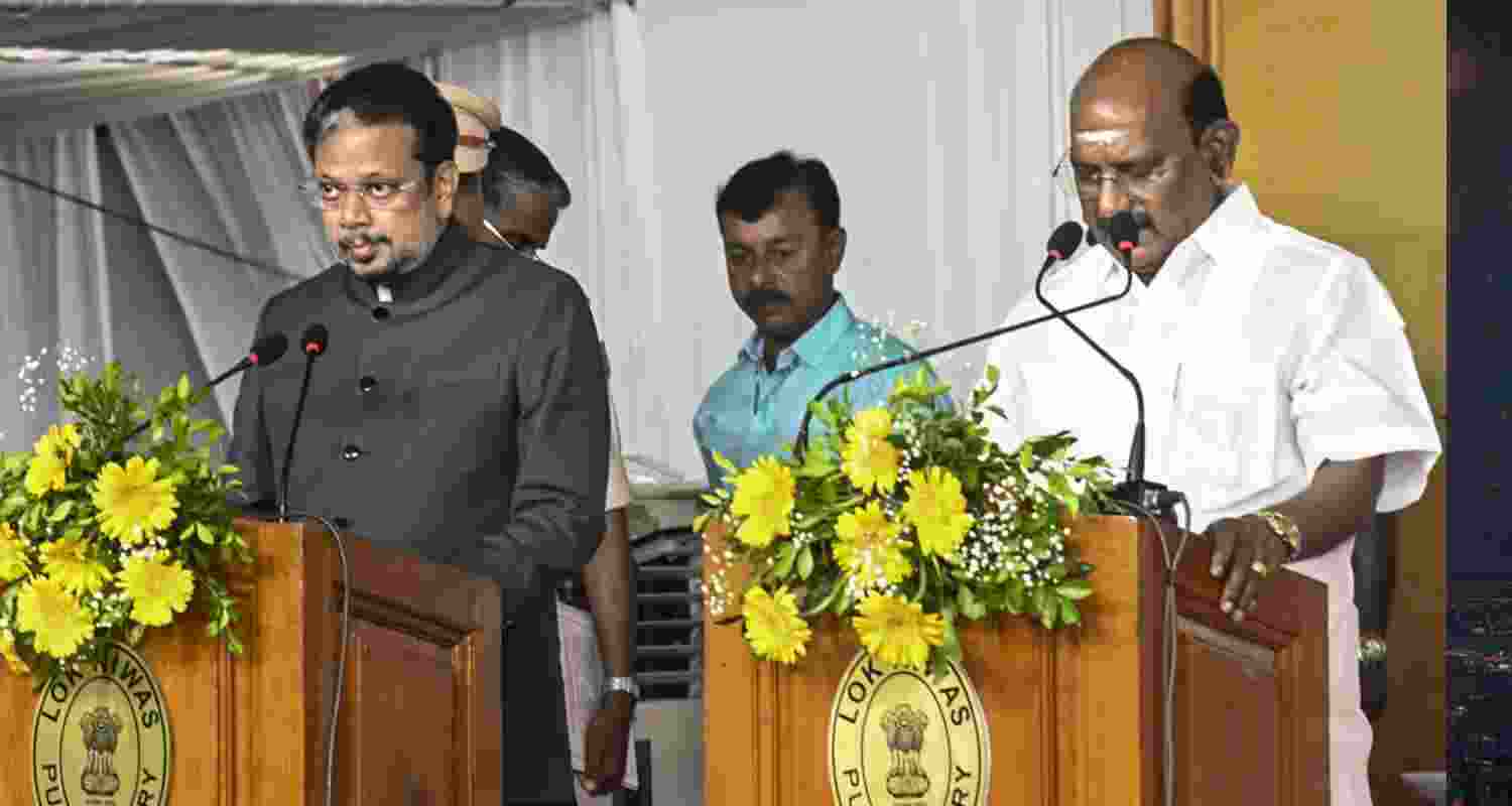 AINRC and BJP MLAs P Rajavelu, V P Sivakolundhu and G N S Rajasekaran were sworn in as ministers, taking Puducherry's cabinet to six.