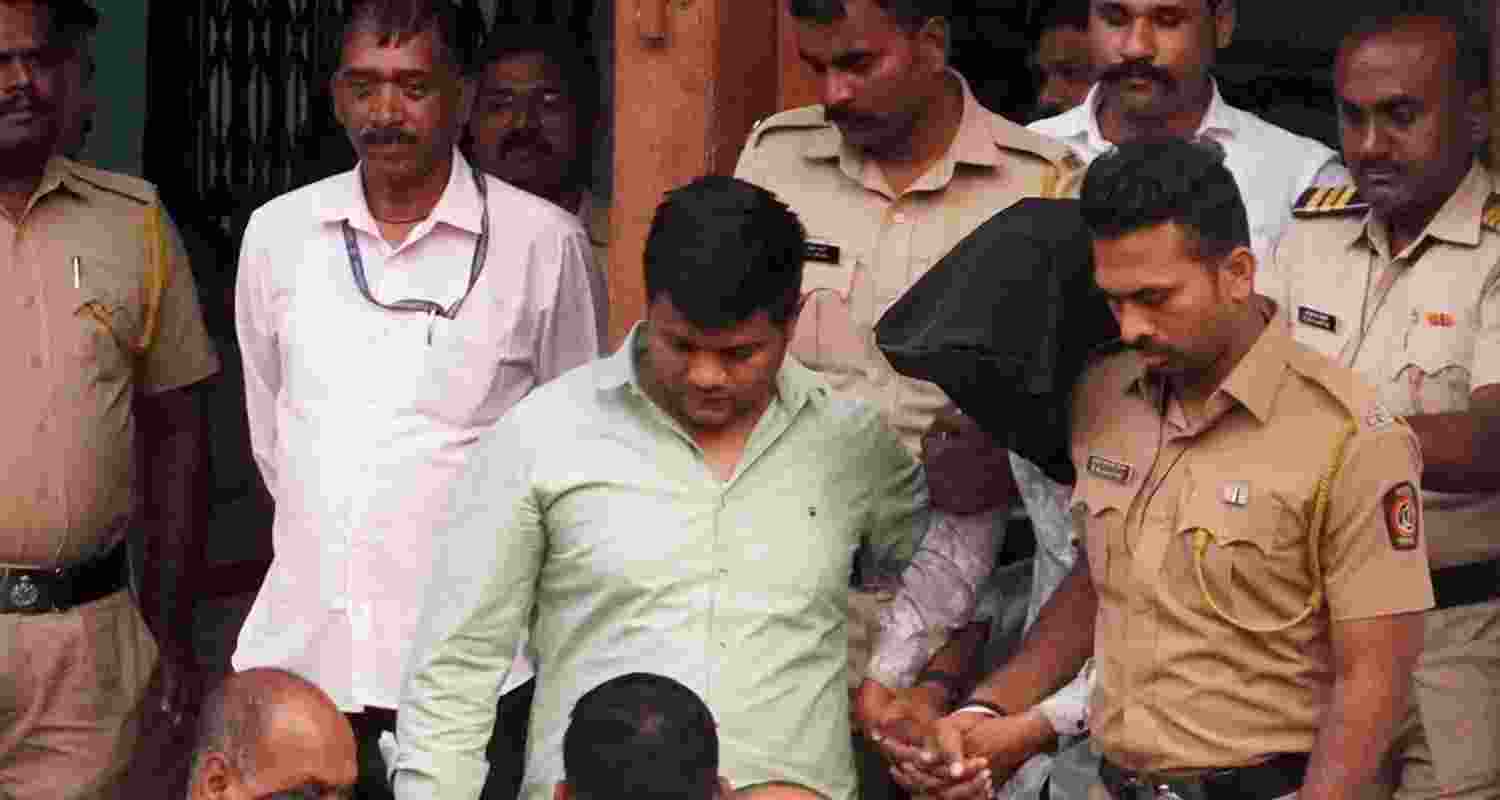 Accused arrested for the alleged sexual assault of a woman inside a parked state transport bus at Swargate terminus, being produced at a court, in Pune.