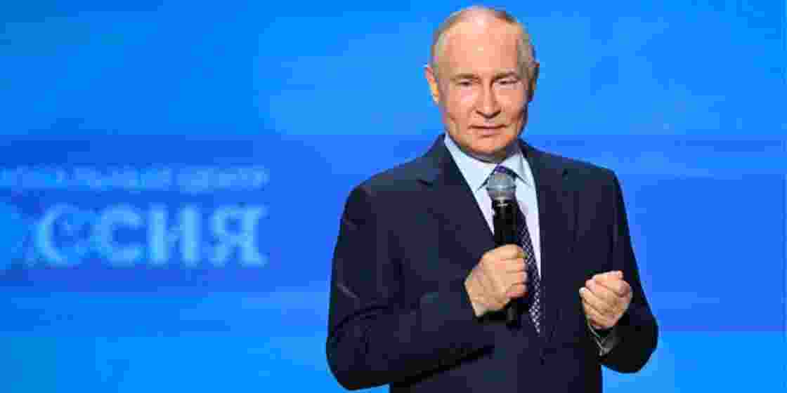 Russian President Vladimir Putin addresses a gathering.