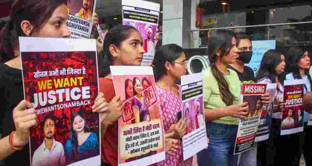Relatives and friends of Raja and Sonam Raghuvanshi seek justice for the couple in Indore. Raja's body was found in a gorge on 2 June, while a search for his wife is underway. (Photo: PTI)