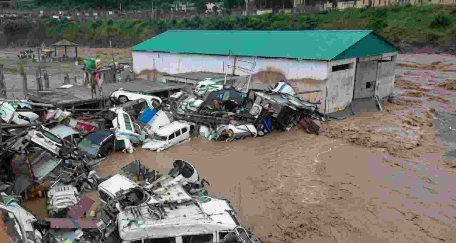 Flash floods inundated Rajouri after heavy overnight rain, forcing evacuations as swollen rivers submerged homes and damaged public infrastructure.