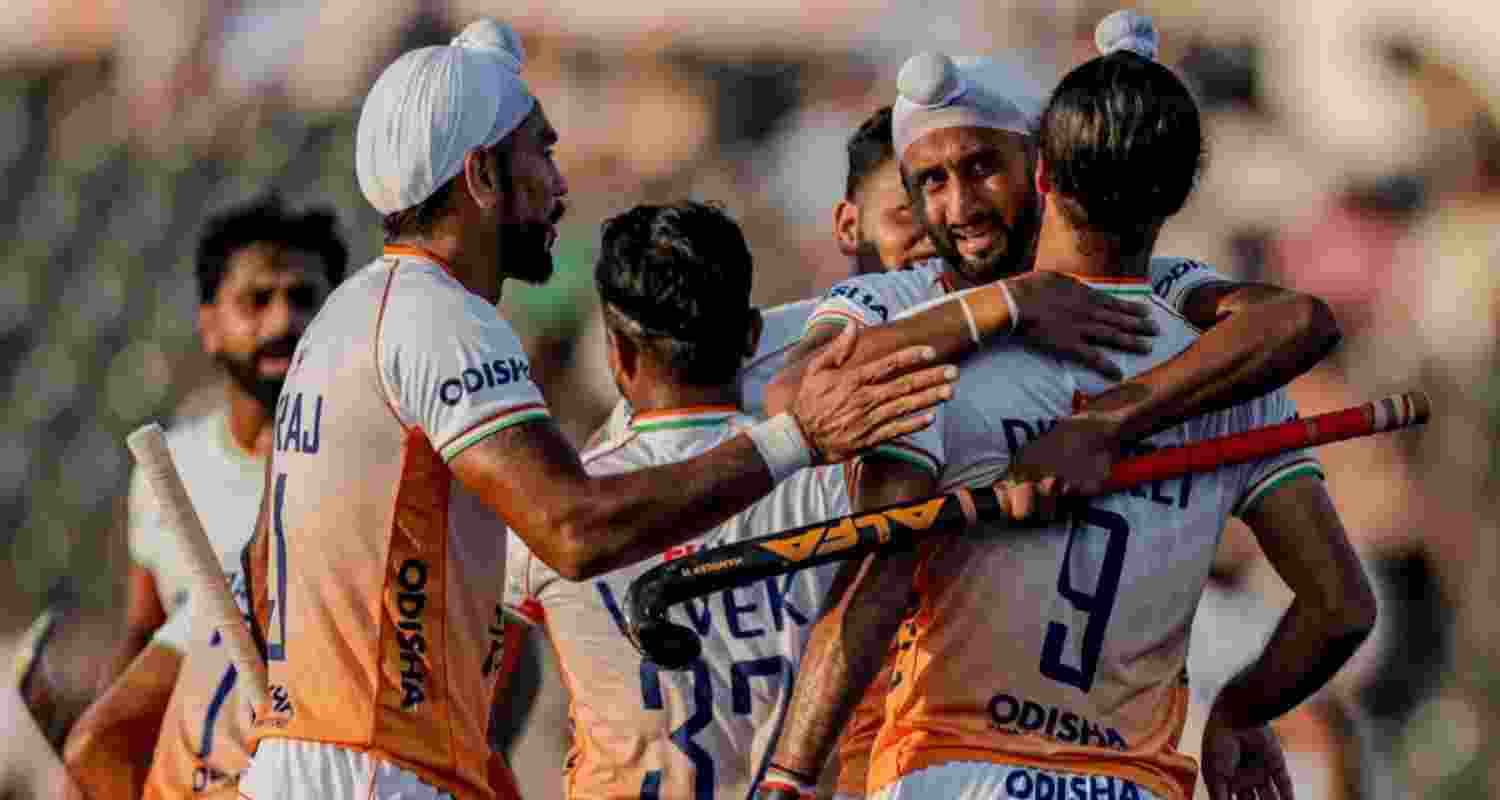 Indian players celebrating a regulation time goal in their match against England.