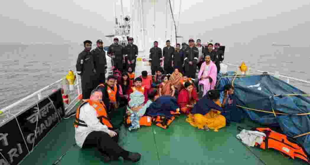 Rescued passengers are brought to safety after a Navy speed boat collided with the Neel Kamal ferry off the Mumbai coast. Thirteen people died in the tragic incident, with 99 survivors rescued.
