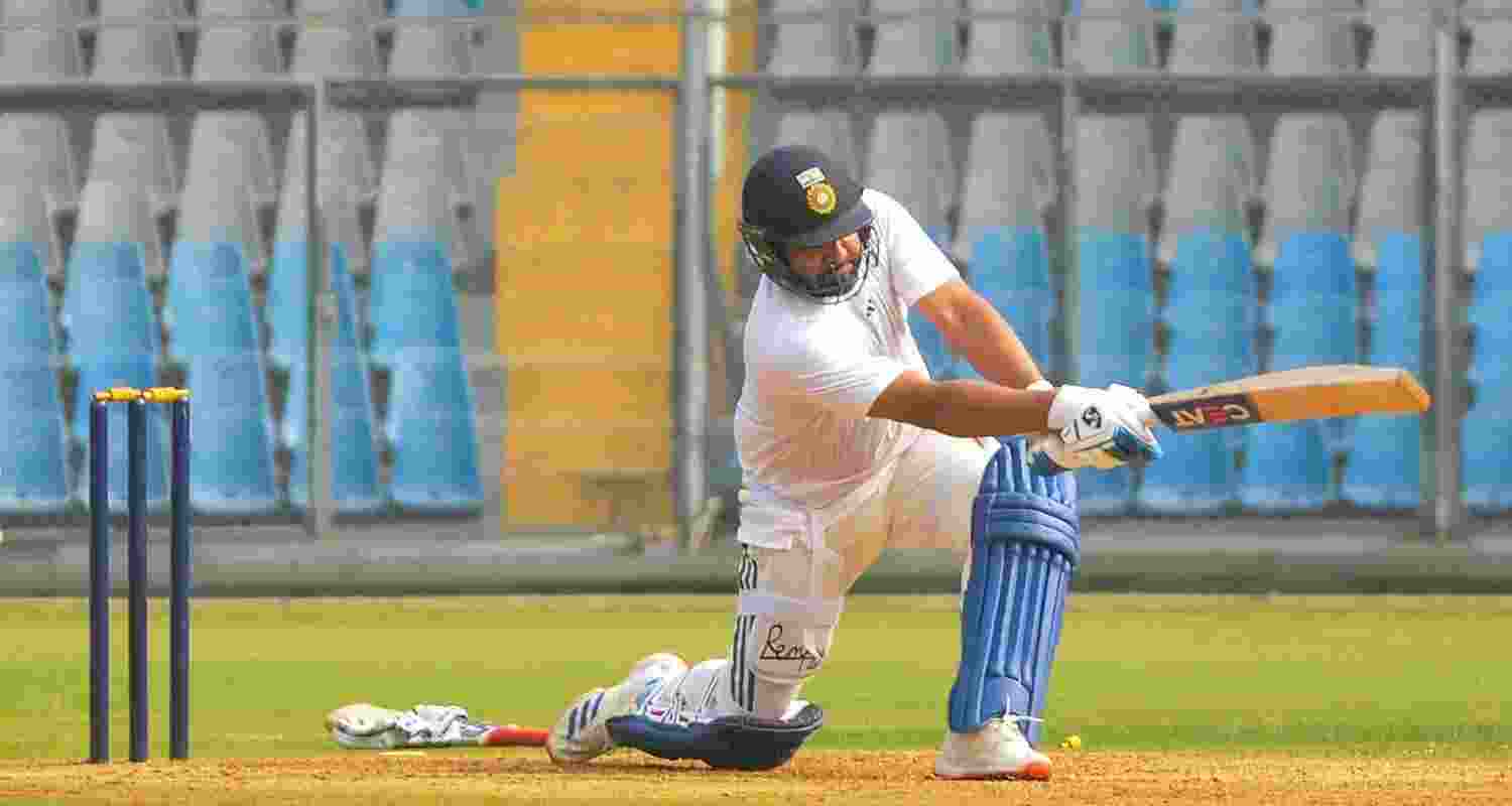 Indian cricketer Rohit Sharma bats during a practice session of Mumbai's Ranji Trophy team, at Wankhade Stadium, in Mumbai, Tuesday. Indian cricketer Rohit Sharma bats during a practice session of Mumbai's Ranji Trophy team, at Wankhade Stadium, in Mumbai, Tuesday.
