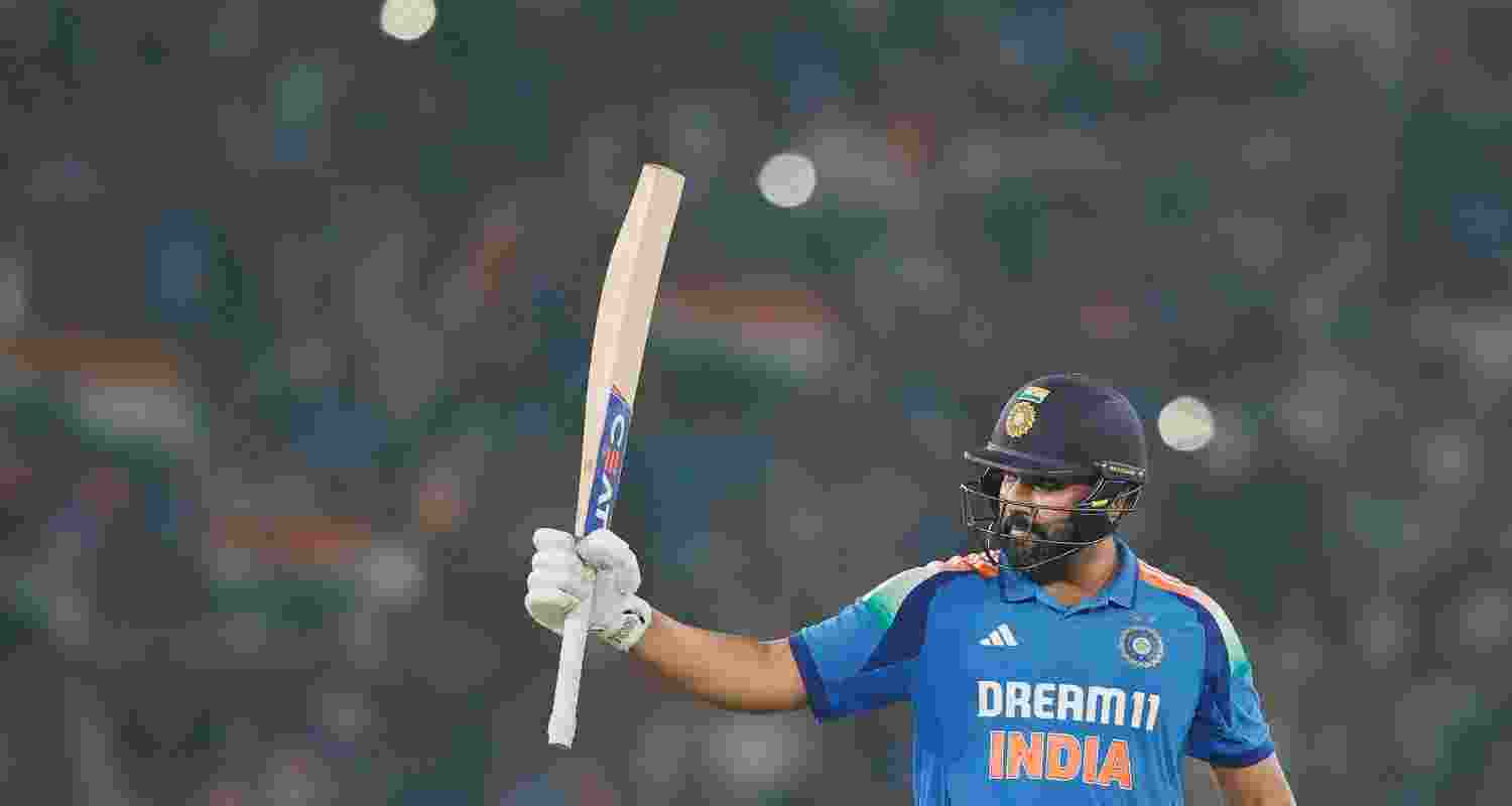 Indian skipper Rohit Sharma celebrates a century.