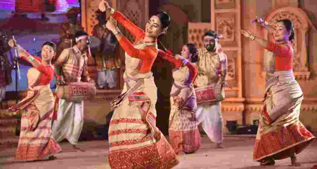 Folk dancers perform during the Rongali festival in Assam.