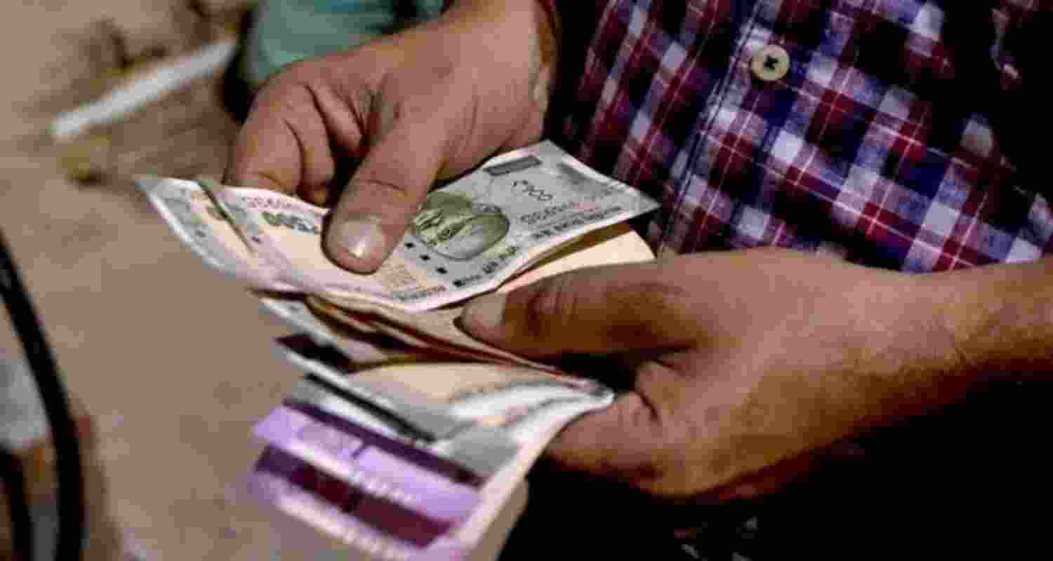 Rupee falls 15 paise to 95.56 against US dollar in early trade