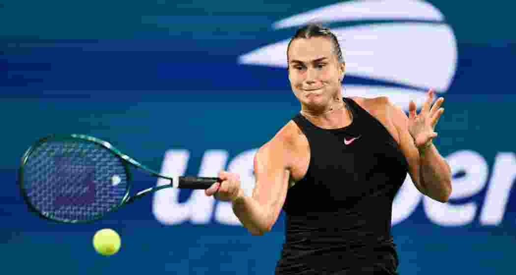 Aryna Sabalenka returns a shot during a match.