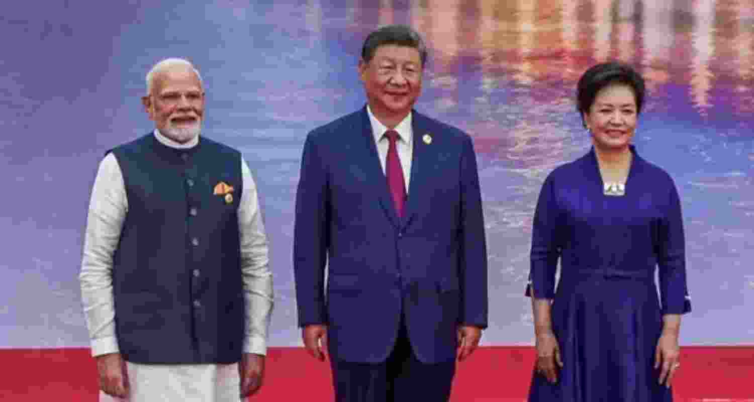 PM Modi poses for group photo with world leaders at SCO summit reception in Tianjin, China on Sunday.