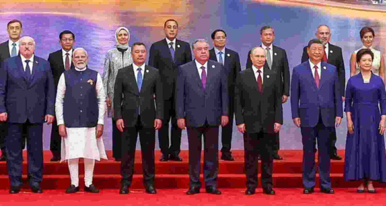 Prime Minister Narendra Modi, in a group picture with Chinese President Xi Jinping, his wife Peng Liyuan, Russian President Vladimir Putin and other SCO leaders during the Official Reception for Heads of States and Heads of Governments at the SCO Summit, in Tianjin on Sunday. 