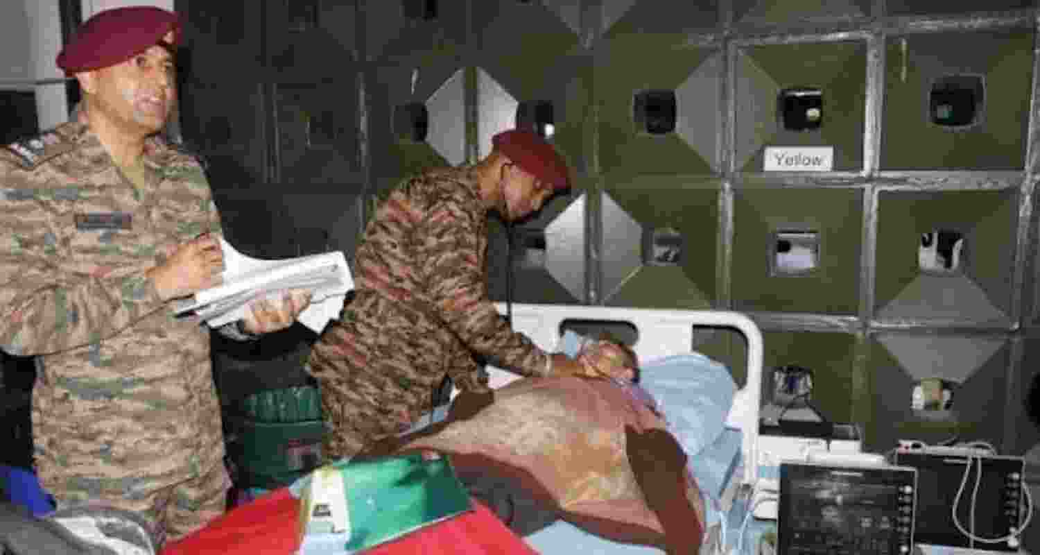India's Army Field Hospital staff attending to an earthquake victim in Venezuela.