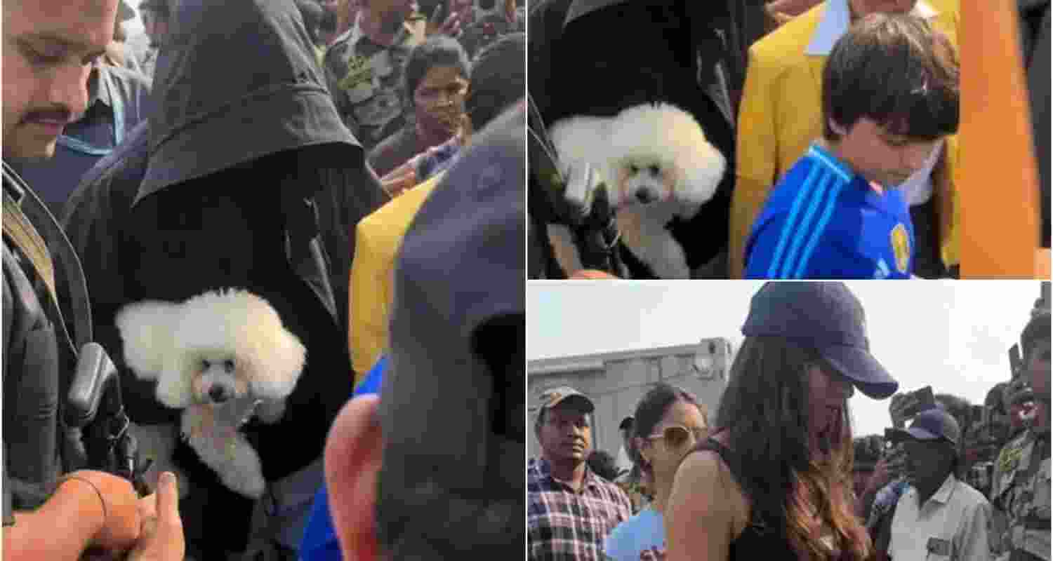 Shah Rukh Khan was spotted holding a dog in his hands.