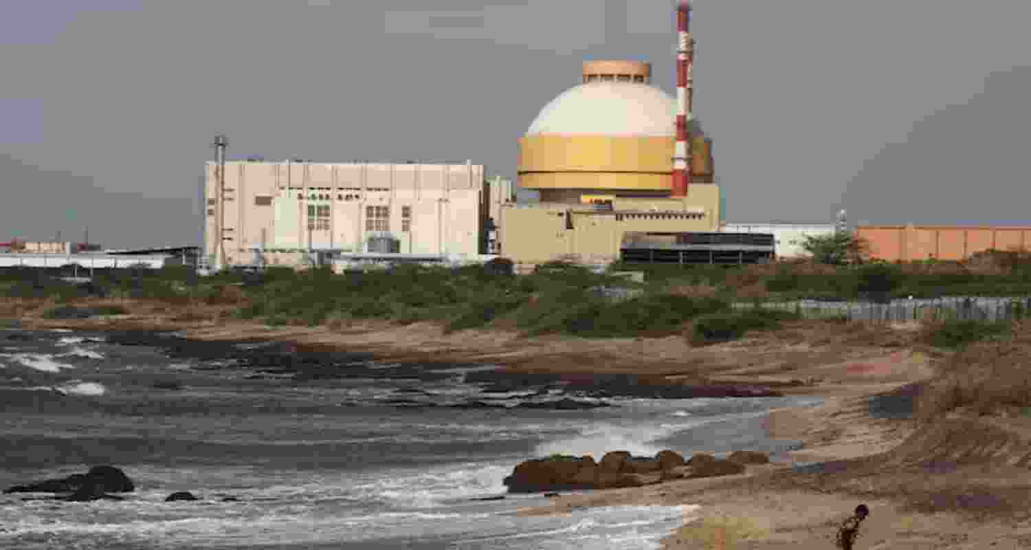 A policeman walks on a beach near the Kudankulam nuclear power plant in Tamil Nadu. 