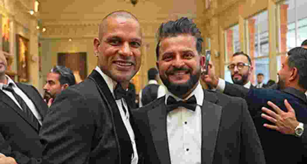 Former India teammates Suresh Raina and Shikhar Dhawan seen together in a file photo.