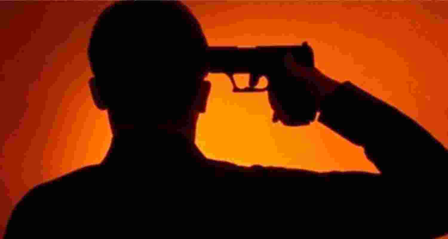 Image of a man shooting himself. Image of a man shooting himself.