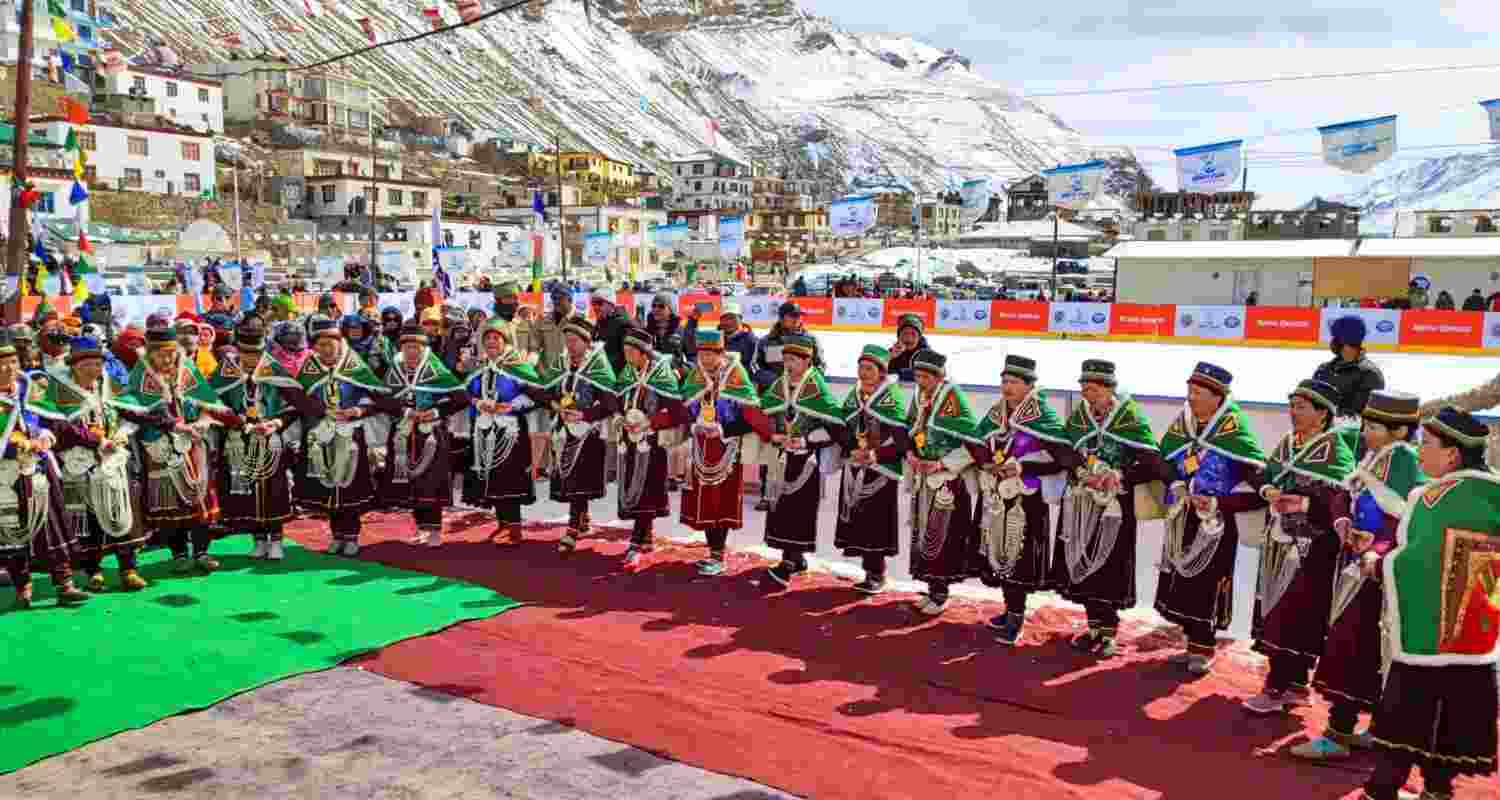 Lahaul and Spiti: Local artists perform the traditional dance 'Nati' during the inauguration of Ice Hockey Cup 2024 and Ice Speed Skates at an ice hockey rink at Kaza, in Lahaul and Spiti district, Himachal Pradesh. In the background are the snow-capped mighty Himalayas, that surround the picturesque valley. Lahaul and Spiti: Local artists perform the traditional dance 'Nati' during the inauguration of Ice Hockey Cup 2024 and Ice Speed Skates at an ice hockey rink at Kaza, in Lahaul and Spiti district, Himachal Pradesh. In the background are the snow-capped mighty Himalayas, that surround the picturesque valley.