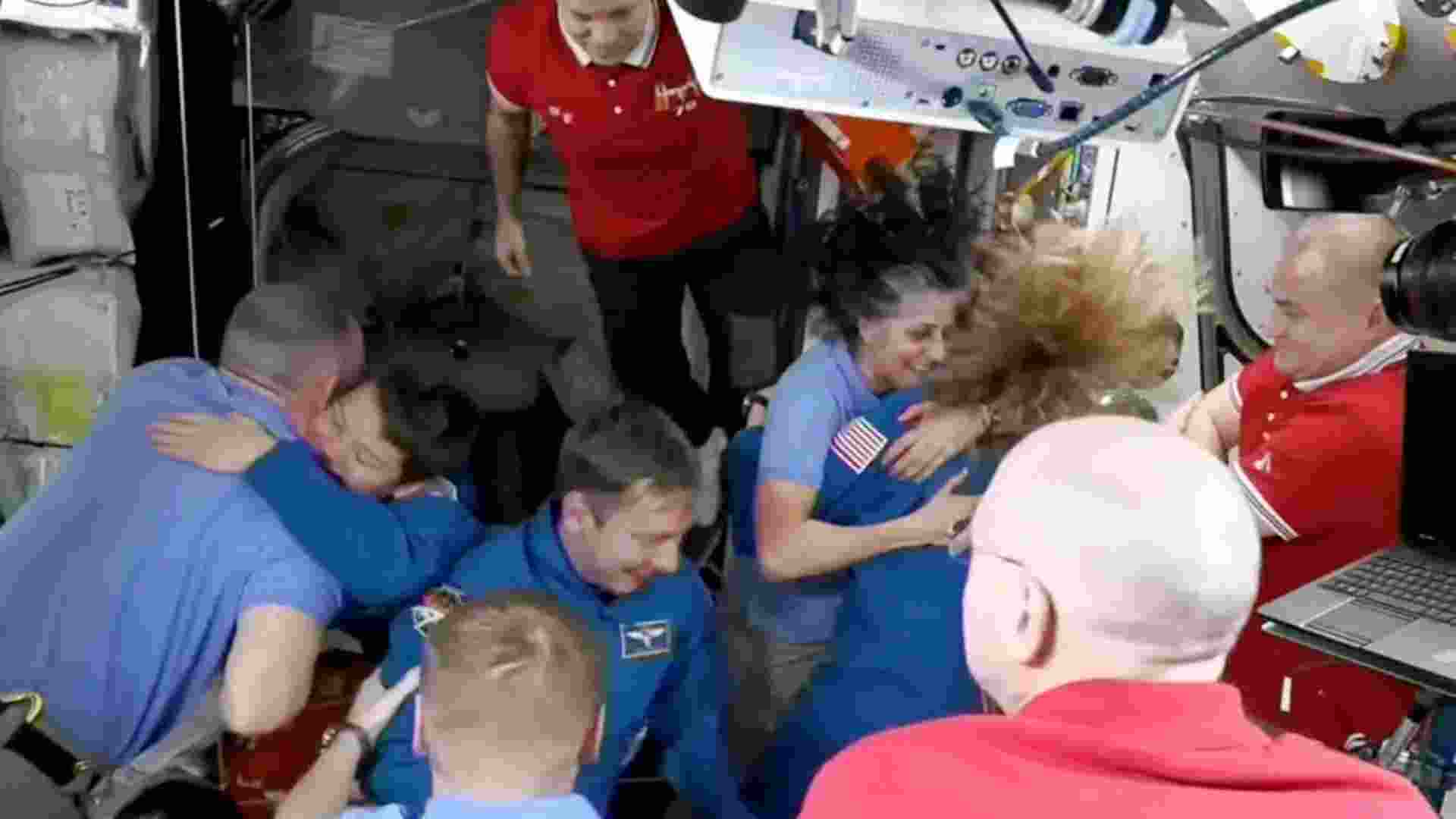 In this screenshot from a NASA video shows Sunita Williams and other astronauts greeting each other after the SpaceX capsule docked with the International Space Station, Sunday.