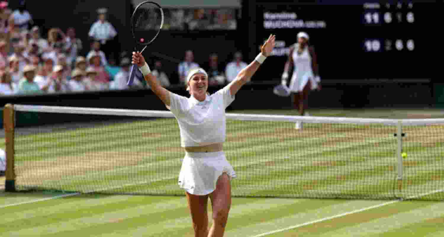 Czech Republic's Karolina Muchova celebrates after winning her Wimbledon semifinal against Coco Gauff of the US.