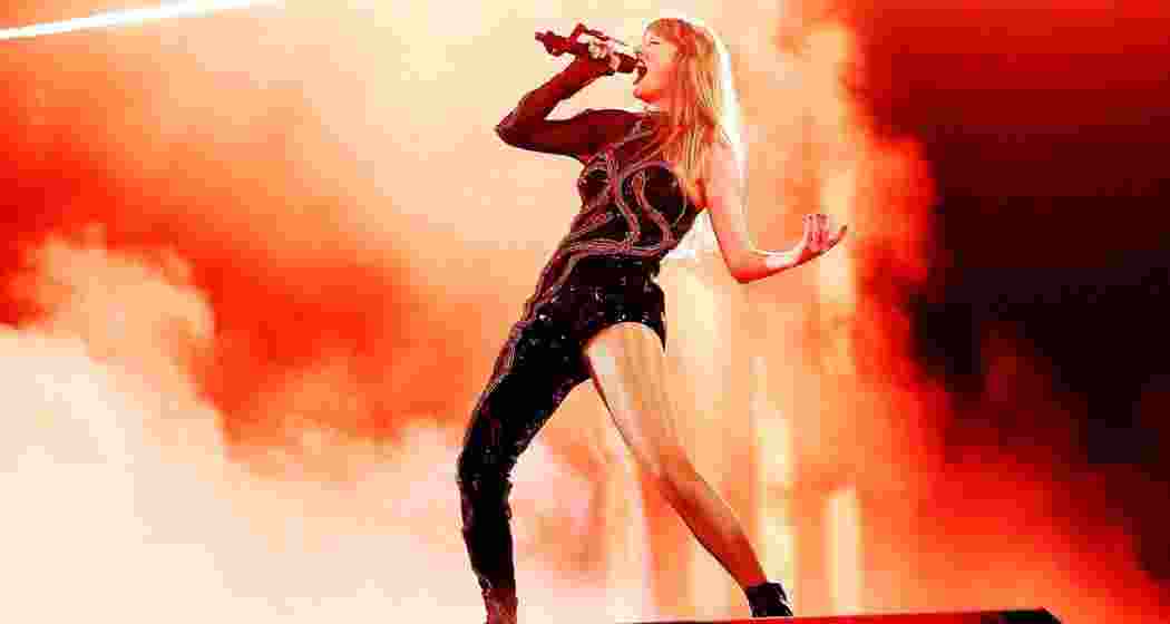 Taylor Swift captivates the audience during a live concert performance. Taylor Swift captivates the audience during a live concert performance.