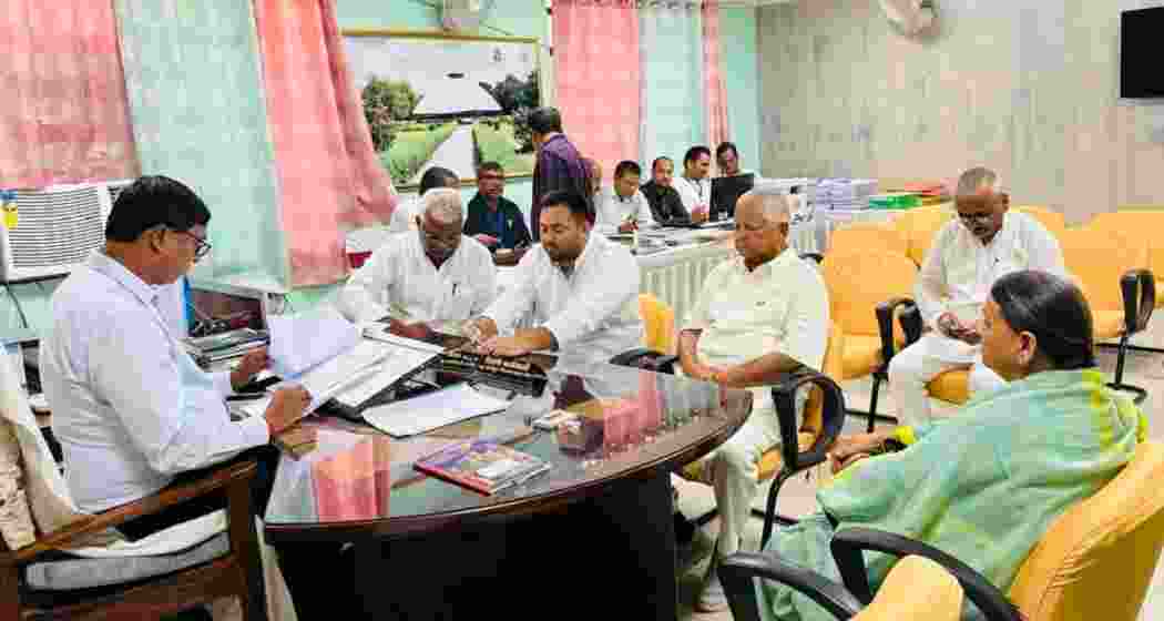 Tejashwi Yadav, accompanied by Lalu Prasad Yadav and Rabri Devi, files his nomination from Raghopur for the upcoming Bihar Assembly elections. Tejashwi Yadav, accompanied by Lalu Prasad Yadav and Rabri Devi, files his nomination from Raghopur for the upcoming Bihar Assembly elections.