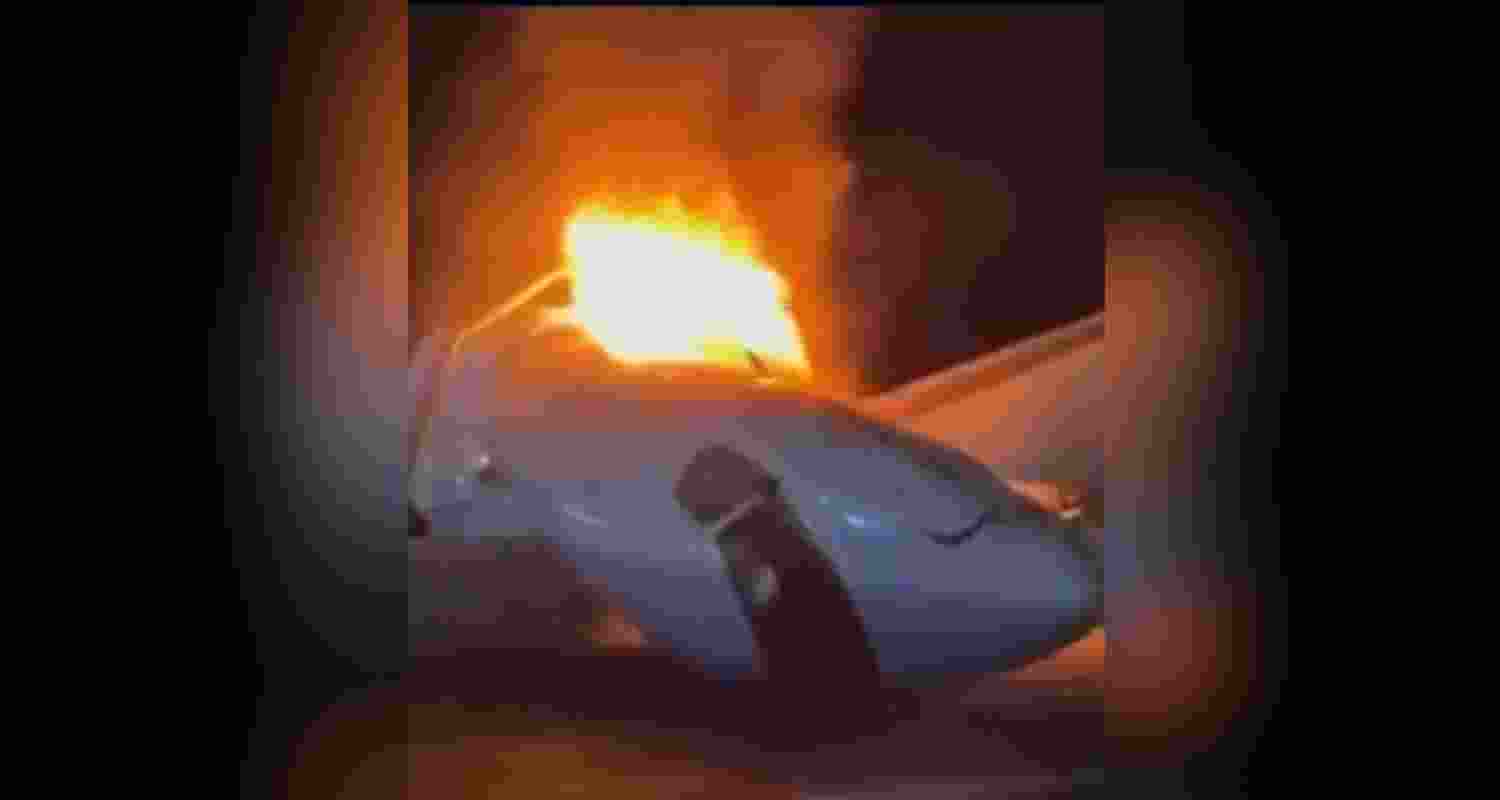 A small plane crashed and caught fire on a Texas highway, killing one of six people onboard as bystanders rushed to rescue survivors.