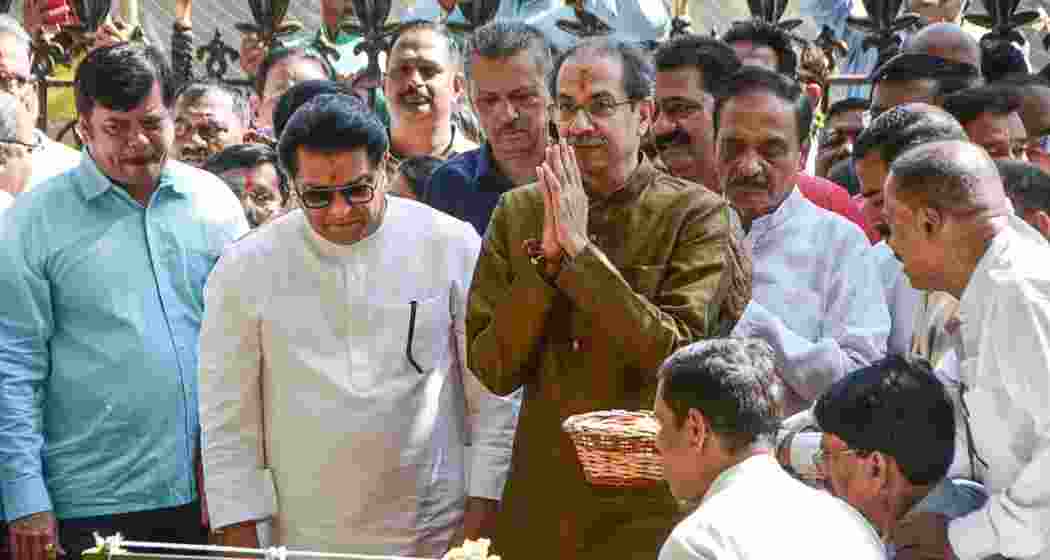 MNS chief Raj Thackeray and Shiv Sena (UBT) chief Uddhav Thackeray pay tributes at the memorial of Shiv Sena founder Bal Thackeray at Shivaji Park ahead of their alliance announcement.