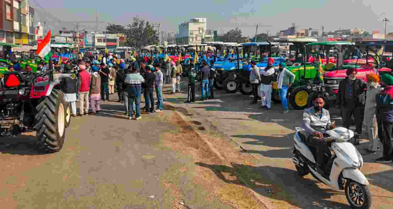 Farmers during a tractor march after a 'jatha' (group) of 101 farmers made three attempts to enter Delhi on foot on December 6, December 8 and again on December 14 but were not allowed to proceed by security personnel in Haryana, in Ambala, Haryana, Monday. 