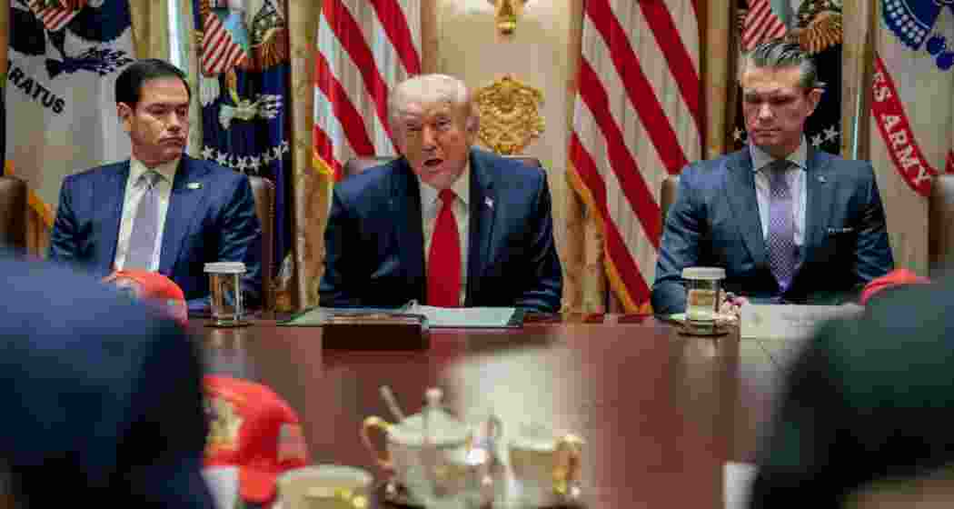 US President Donald Trump speaks during a Cabinet meeting at the White House in Washington on Wednesday, alongside Secretary of State Marco Rubio and Defence Secretary Pete Hegseth.