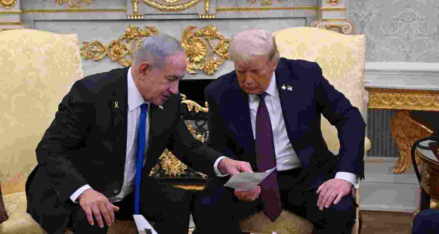 US President Donald Trump and Israeli Prime Minister Benjamin Netanyahu arrive for a joint news conference at the White House on September 29. 