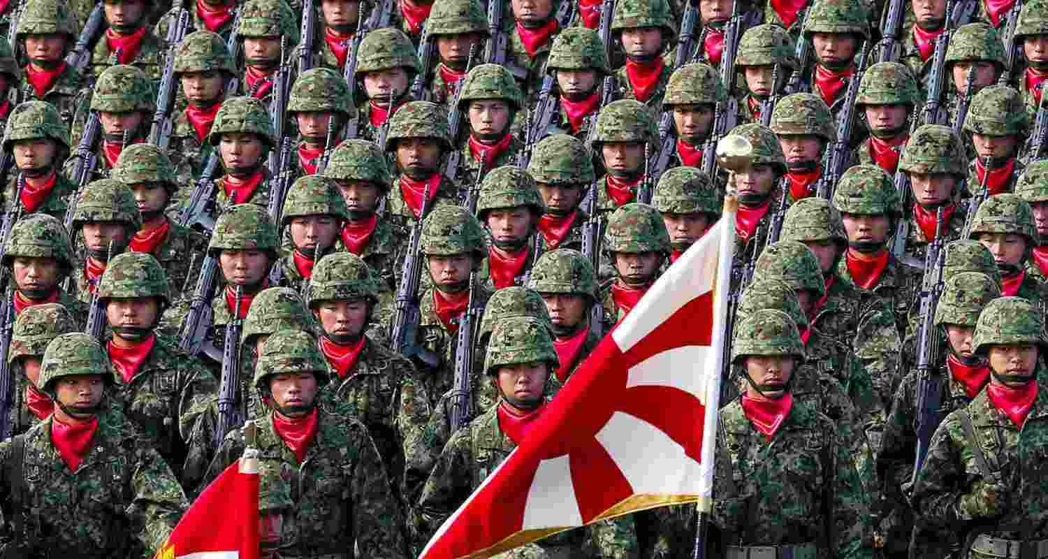 Japan revises pacifist stance over Taiwan invasion risk. Japan revises pacifist stance over Taiwan invasion risk.