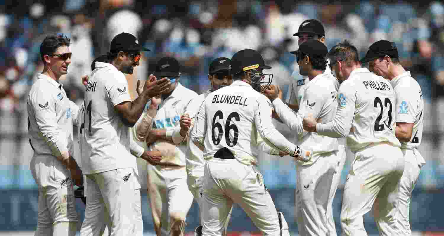 New Zealand's Glenn Philips celebrates with teammates the wicket of India's Ravichandran Ashwin during day three of third Test cricket match between India and New Zealand at Wankhede Stadium, in Mumbai, Sunday, Nov. 3, 2024. New Zealand won the match. 