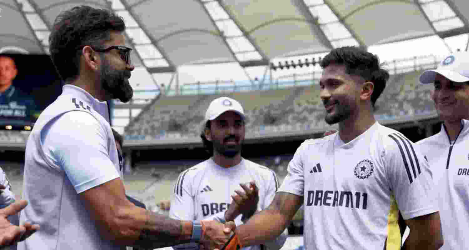 Virat Kohli and Nitish Reddy in the first Test against Australia in Perth. Image: X.