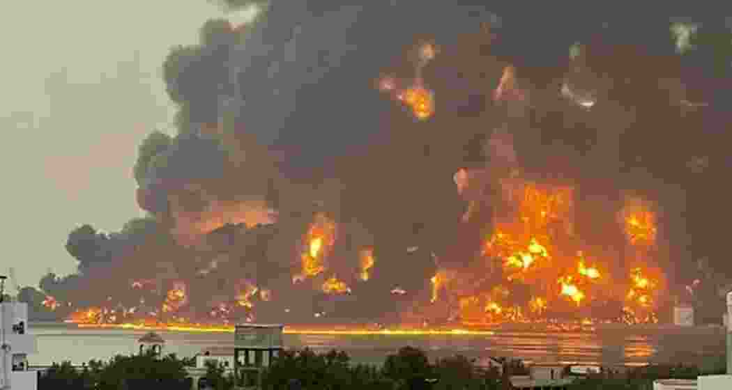 A fireball lights up the sky following US airstrikes on Ras Isa oil port in Yemen, where at least 38 were killed and 102 injured in the escalating conflict.