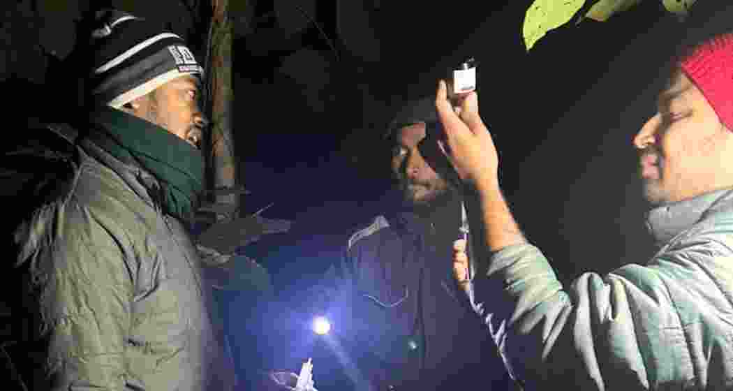 A veterinarian team in Tripura's, Khowai district providing emergency care to the elephant injured by a train.