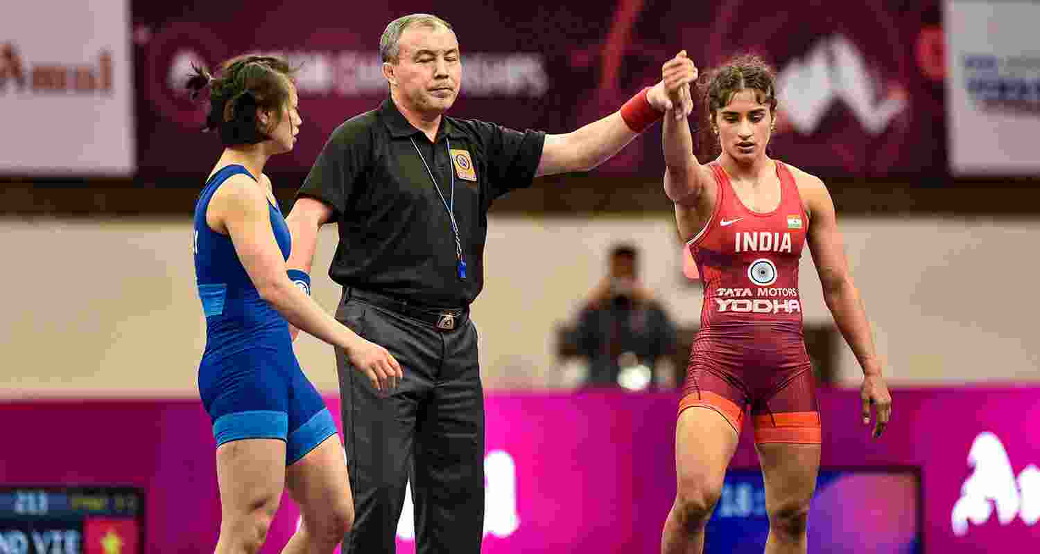 Looking as dominant as ever, Vinesh Phogat made full use of an easy draw to demolish her opponents, placing herself one win away from securing a Paris Olympics quota, while Anshu Malik and U23 world champion Reetika too made it to the semifinals at the Asian Olympic Qualifier Looking as dominant as ever, Vinesh Phogat made full use of an easy draw to demolish her opponents, placing herself one win away from securing a Paris Olympics quota, while Anshu Malik and U23 world champion Reetika too made it to the semifinals at the Asian Olympic Qualifier