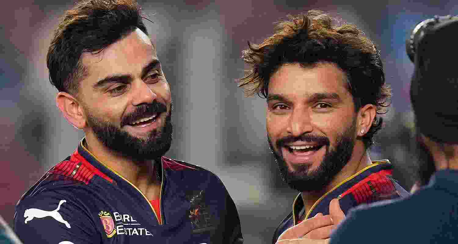 Royal Challengers Bengaluru's captain Rajat Patidar and Virat Kohli celebrate after winning the IPL 2025 T20 final against Punjab Kings at the Narendra Modi Stadium in Ahmedabad on Tuesday.