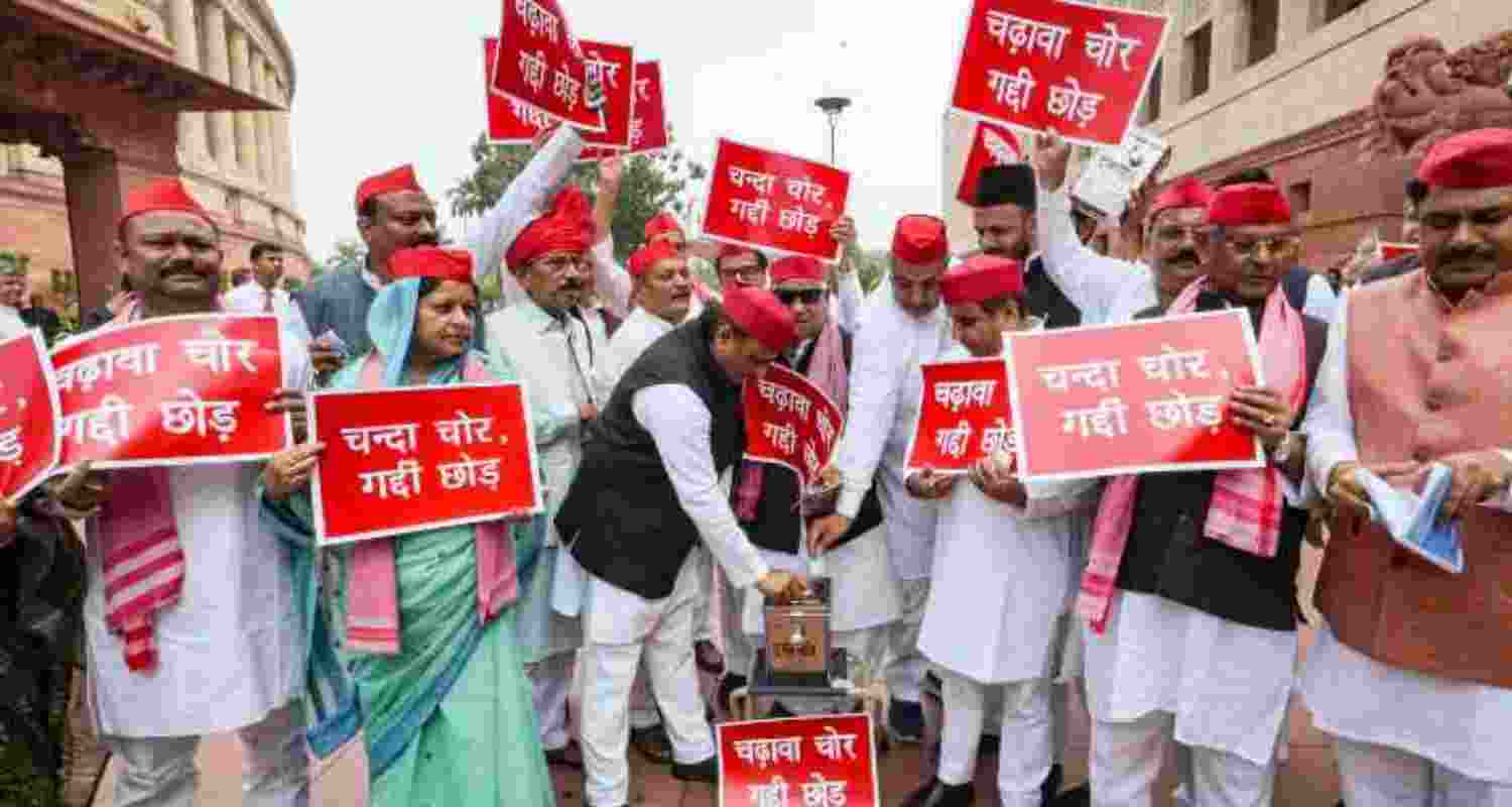 Samajwadi Party MPs holding a protest in the Parliament House complex on Wednesday. 